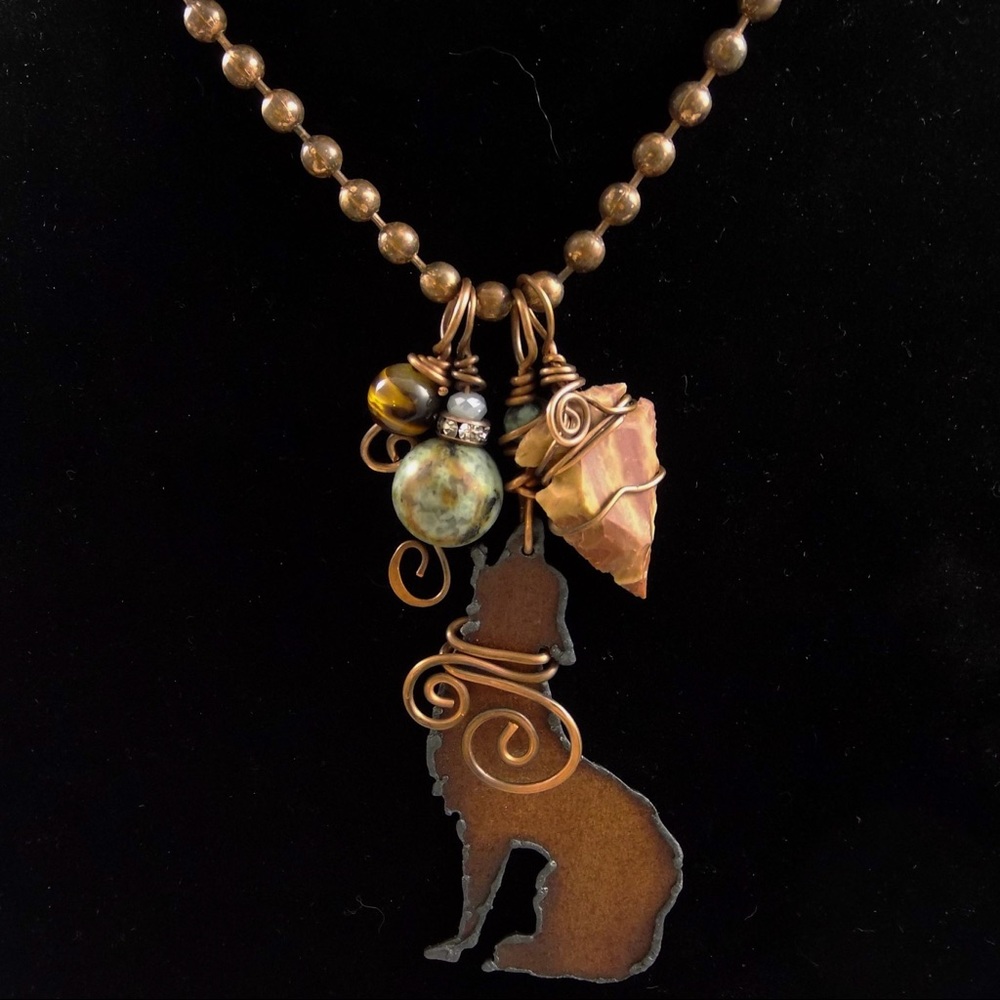Copper howling coyote necklace